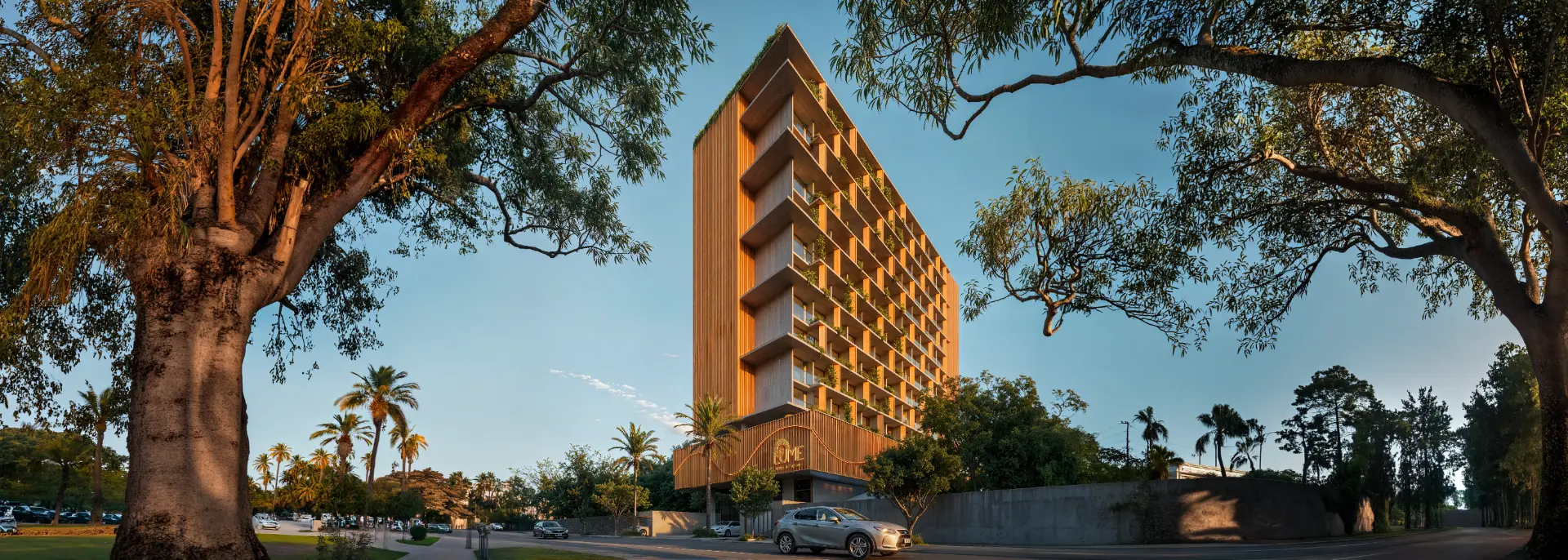 Fachada contemporânea do Edifício Lume ao entardecer